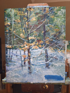 In-studio process shot of oil painting with signature block applied